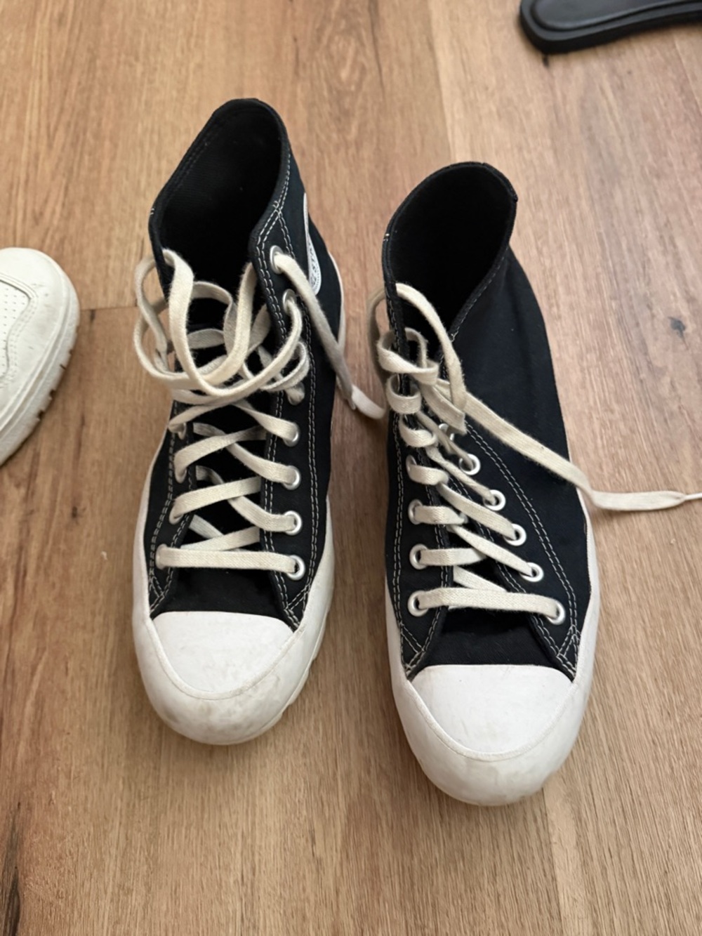 Classic High-Top Converse Sneakers in Black and White